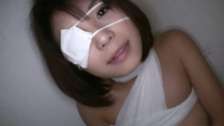 Bandaged Japanese girl Azumi Harusaki gives blowjob