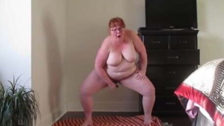 Mature BBW Redhead Masturbates Standing and Squirting